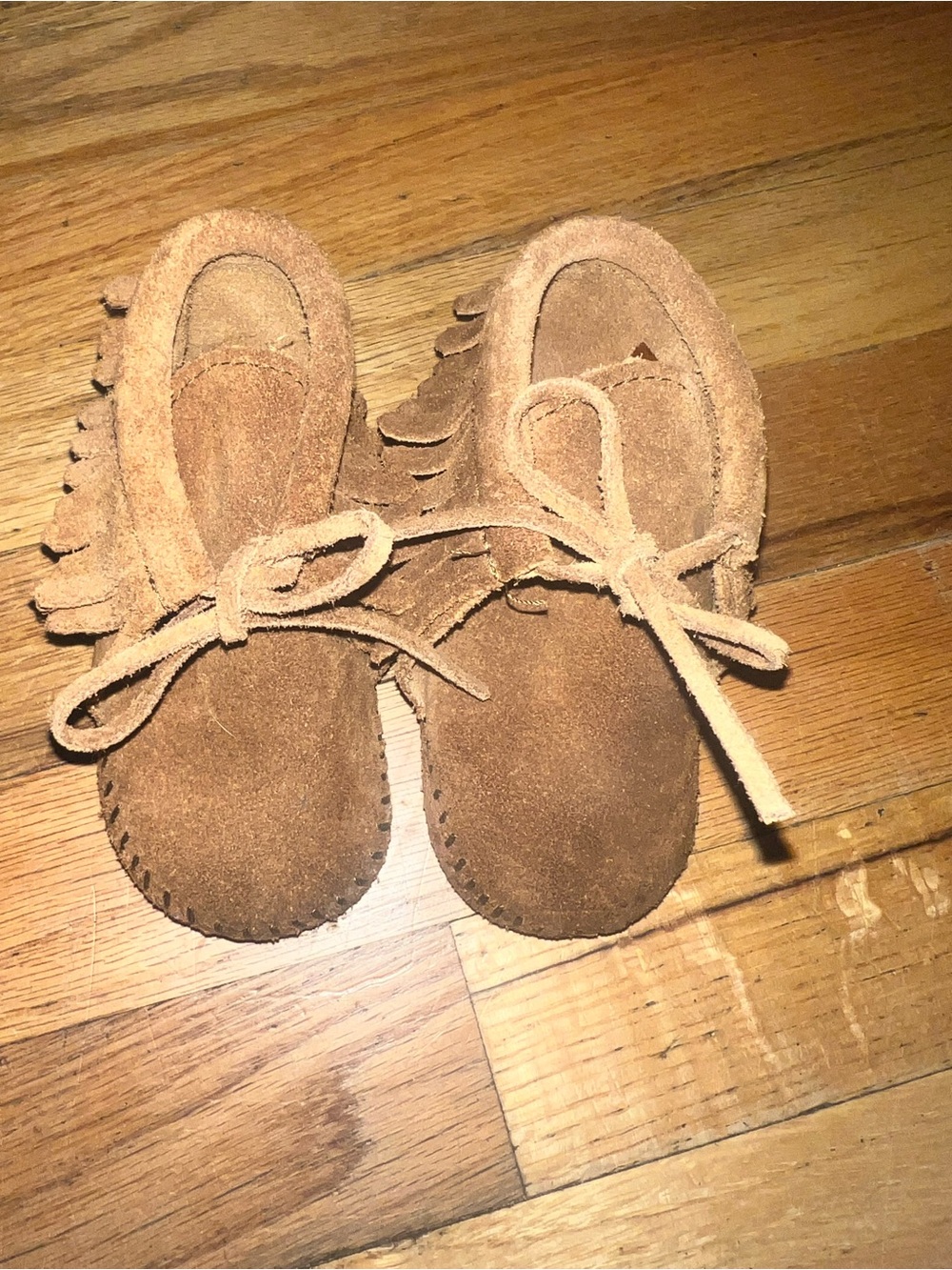 Minnetonka Kids Suede Moccasins in Brown with Fringe
